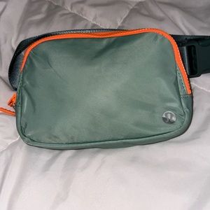 Lululemon tidewater teal/ orange belt bag